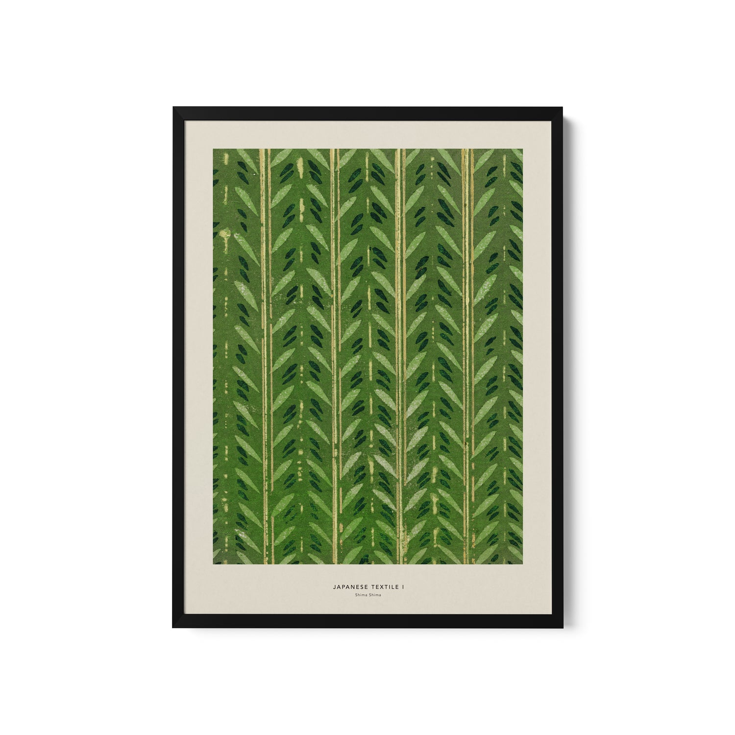 a green leaf print hanging on a wall