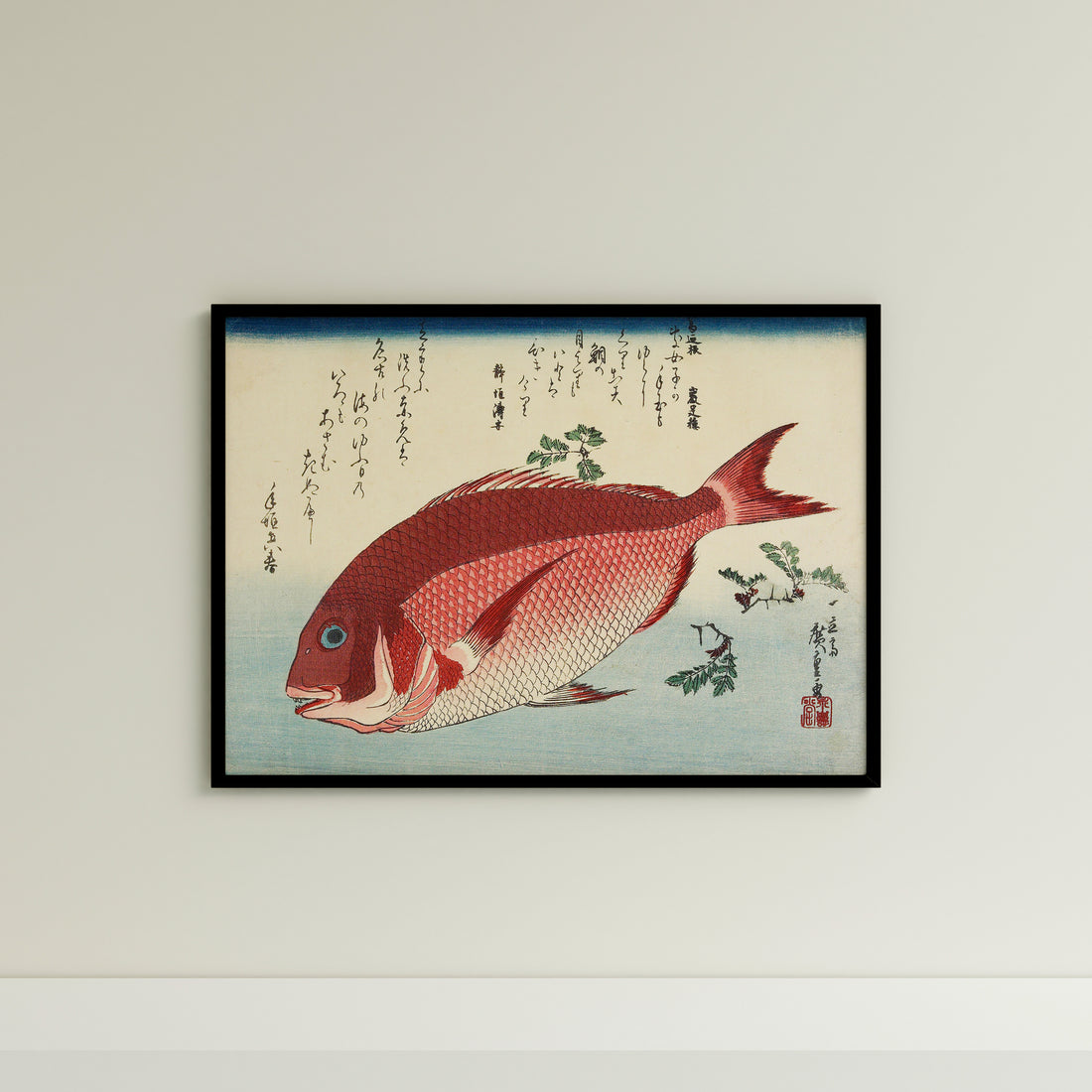 a painting of a red fish on a white wall