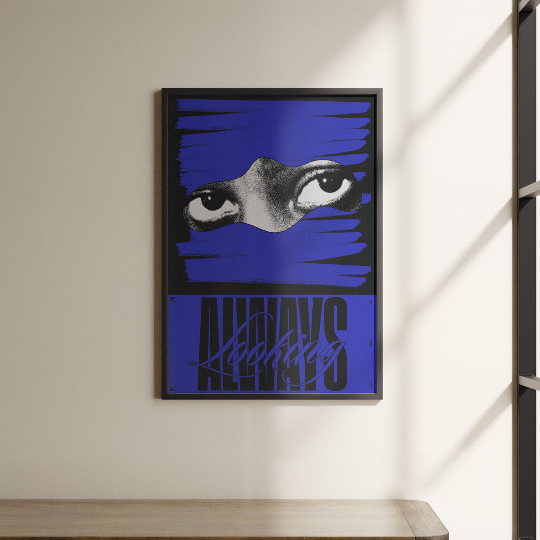 a picture of a blue poster hanging on a wall