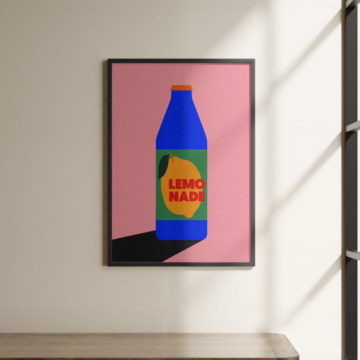 a picture of a bottle of lemonade hanging on a wall