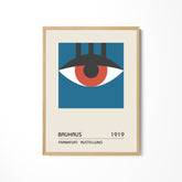 a framed poster of an eye with the words brauhus on it