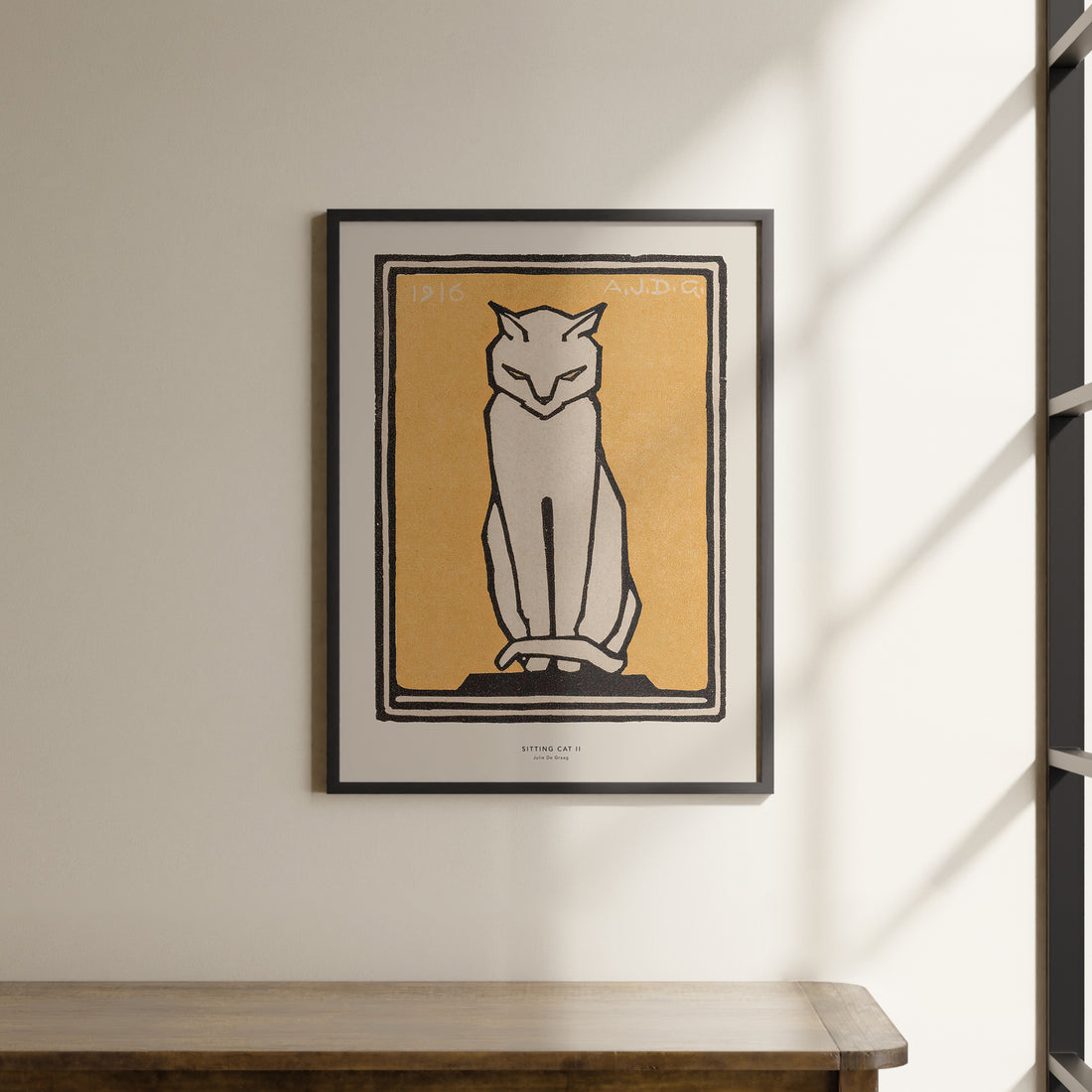 a picture of a cat hanging on a wall