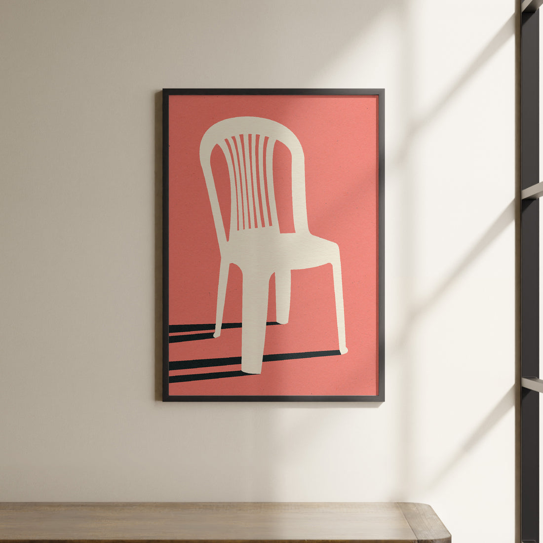 a picture of a chair hanging on a wall