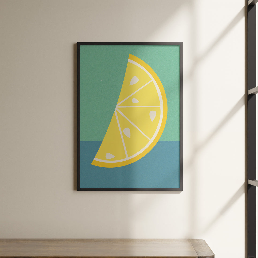 a picture of a lemon slice hanging on a wall